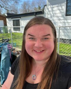 Selfie Rebecca sits in the sun in her backyard in Minnesota